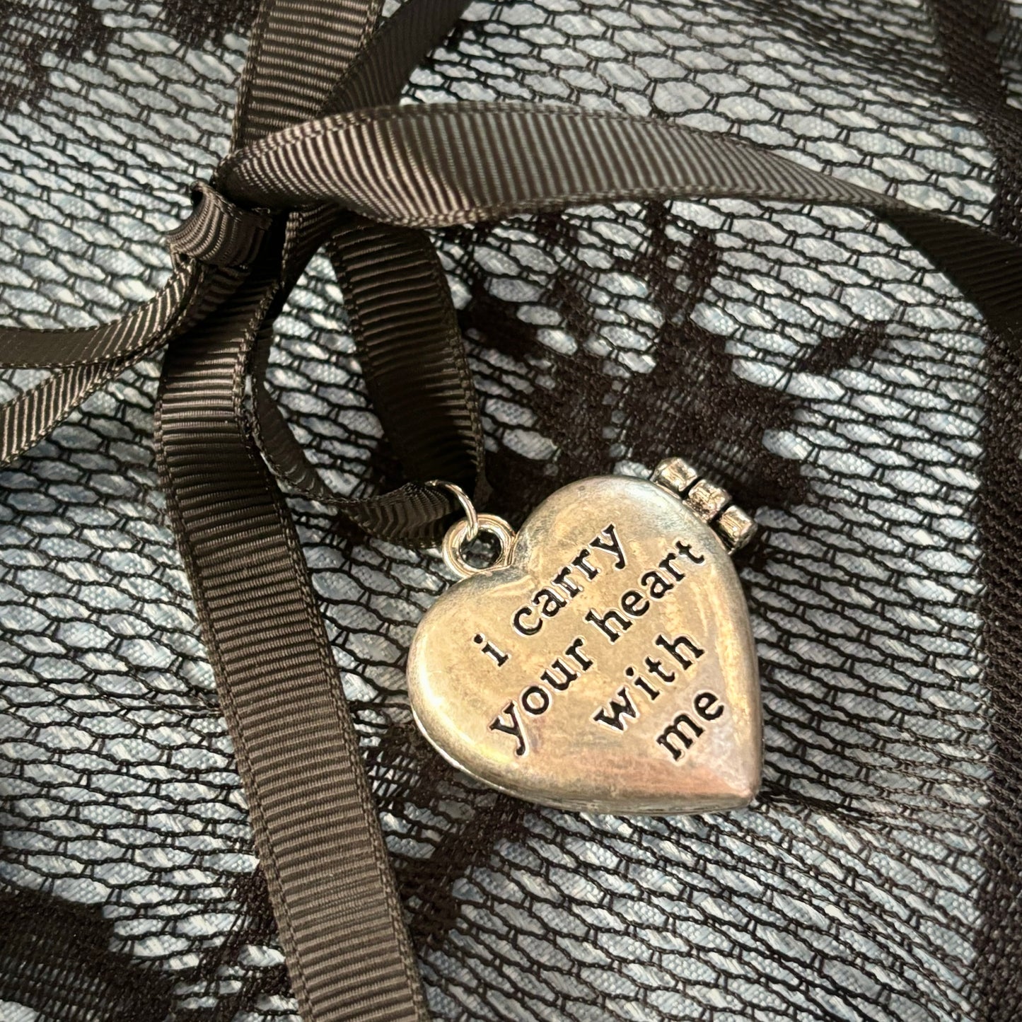 ' carrying your heart ' locket